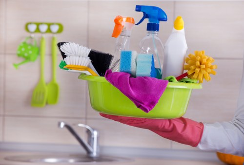 Professional office cleaners working in a Kilburn business premises