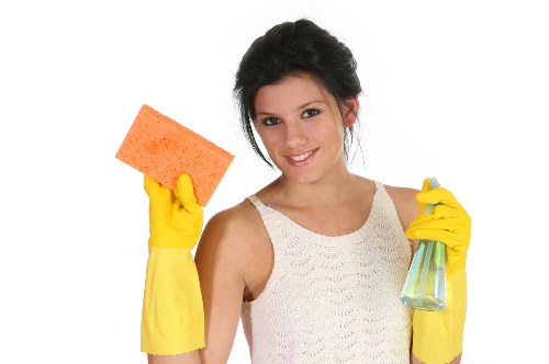 Commercial cleaning team working in a modern NW6 office reception area